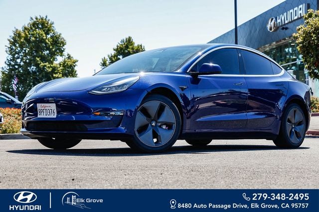 2020 Tesla Model 3 Standard Range Plus in Blue — front three-quarter view