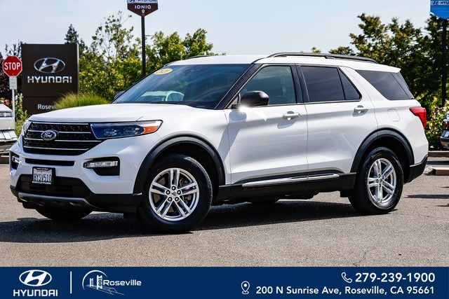 2021 Ford Explorer XLT in Oxford White — front three-quarter view